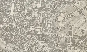 Stary plan miasta, przypominający miejscowy plan zagospodarowania przestrzennego, ukazuje gęstą sieć ulic i budynków.